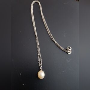 Genuine pearl necklace on with sterling bale & chain